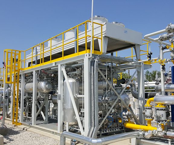 Cooling skid for associated petroleum gas (APG)