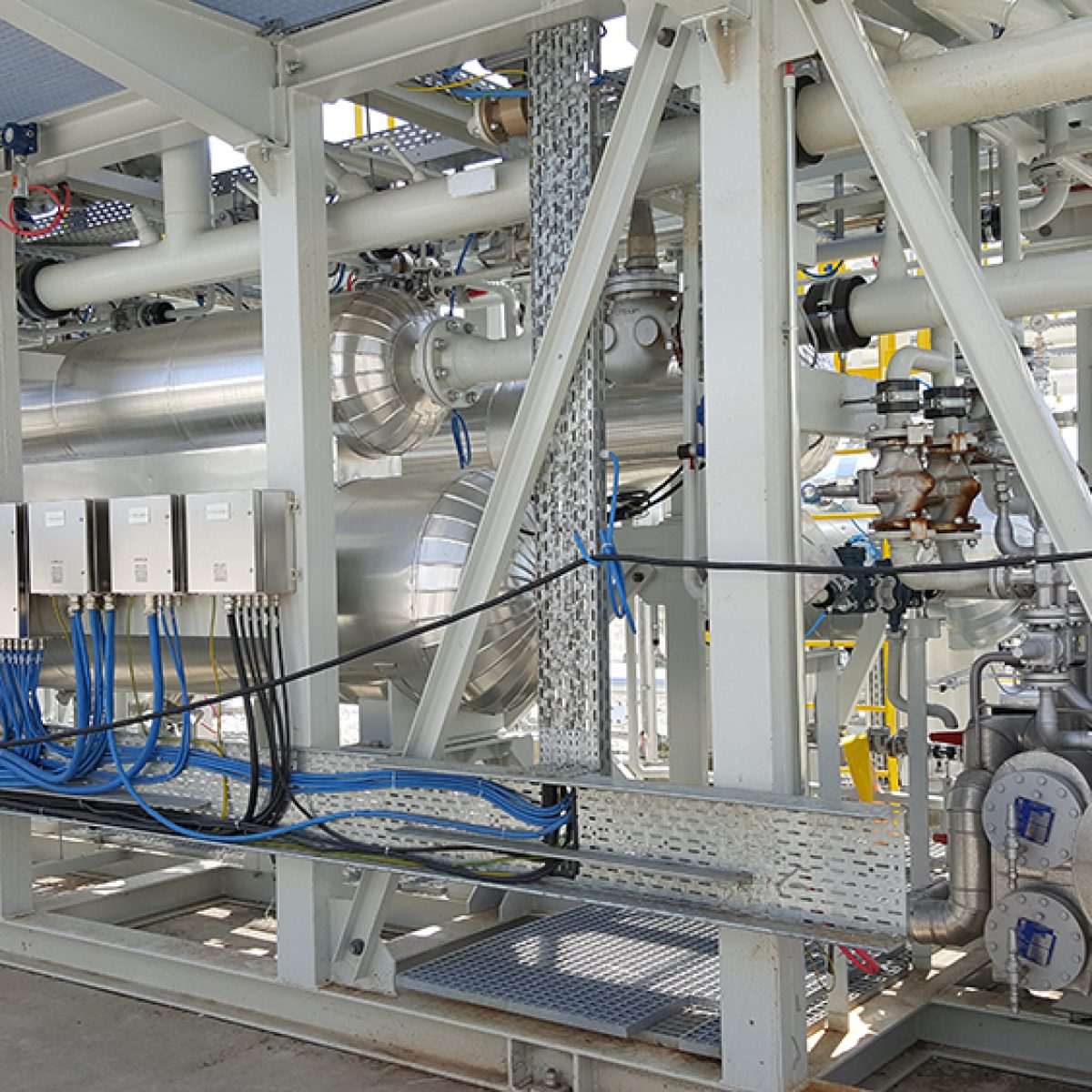Cooling skid for associated petroleum gas (APG)